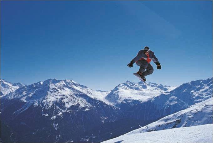 snowboarder jumping in the austrian tirol Boarder_jumping_tirol